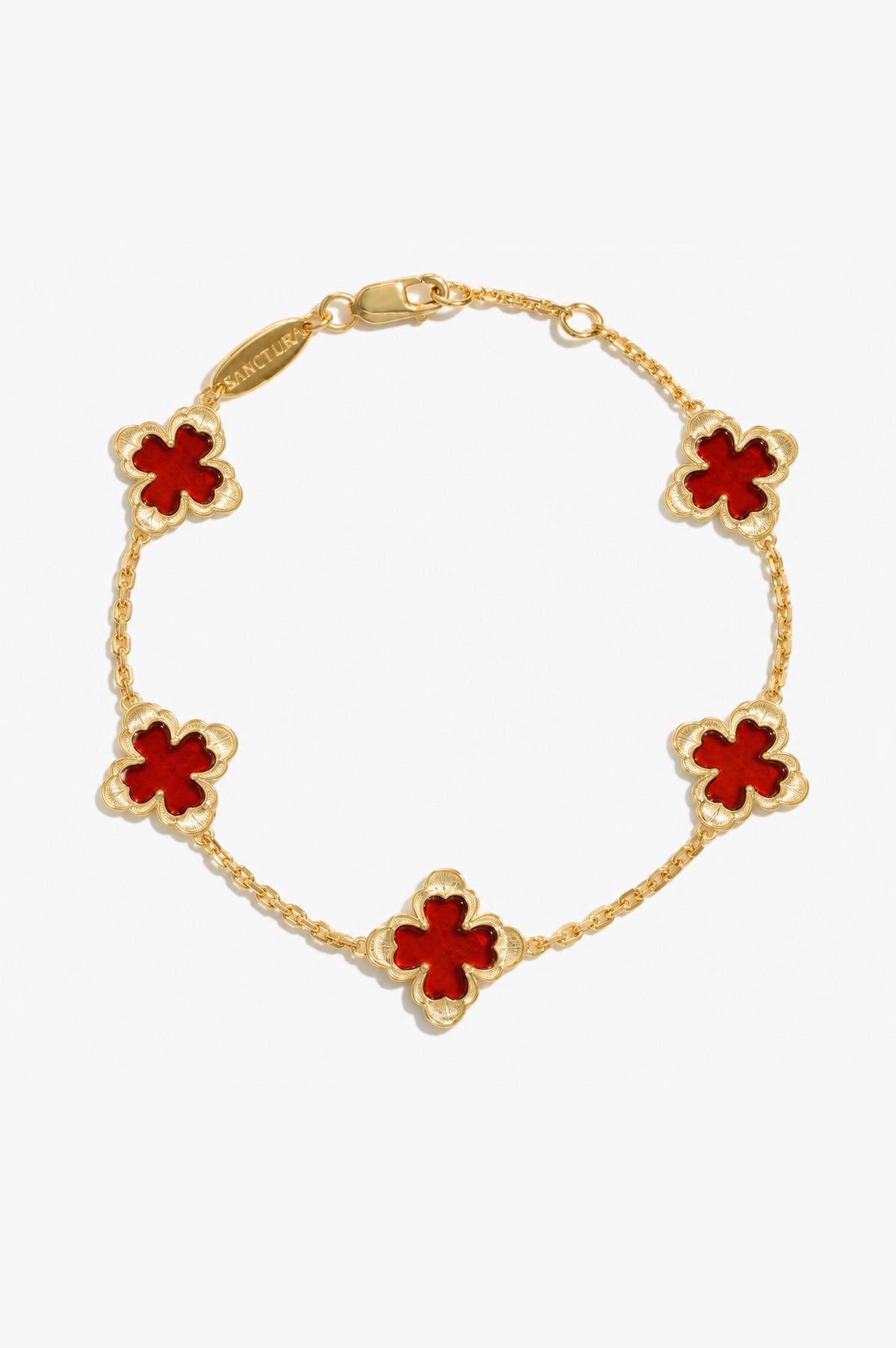 Classic Sacred Bloom Five-Motif Bracelet — Carnelian, five floral motifs and a lobster clasp, gray background