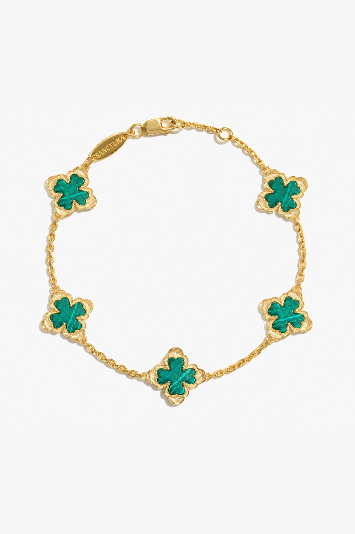 Classic Sacred Bloom Five-Motif Bracelet — Malachite, five floral motifs and a lobster clasp, gray background