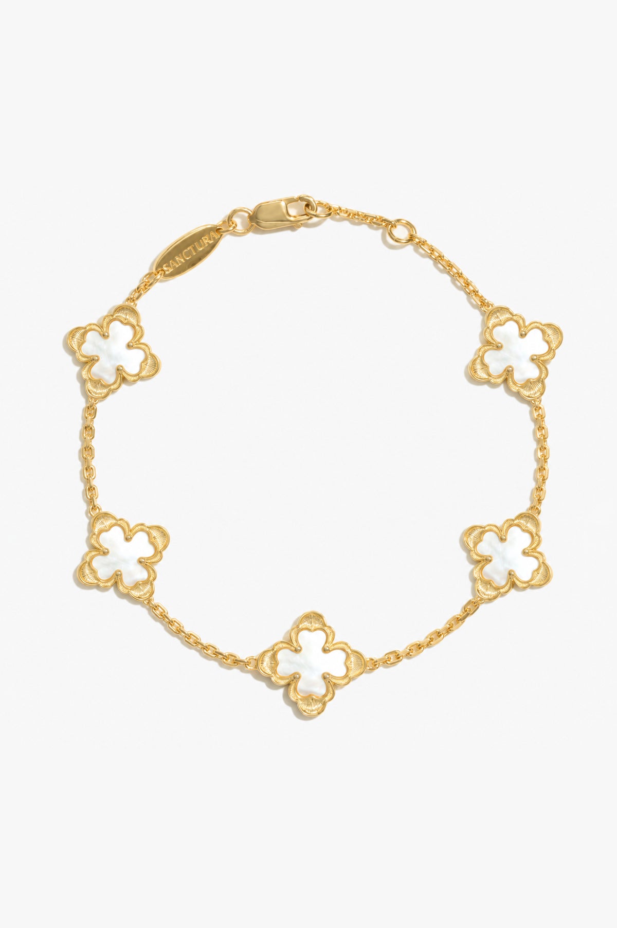 Classic Sacred Bloom Five-Motif Bracelet — Mother-of-Pearl, five floral motifs and a lobster clasp, gray background