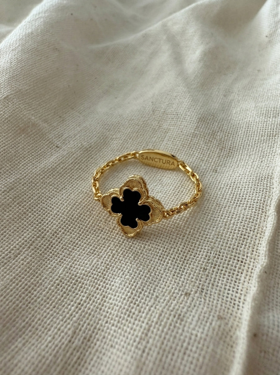 Sanctura ring on natural fabric