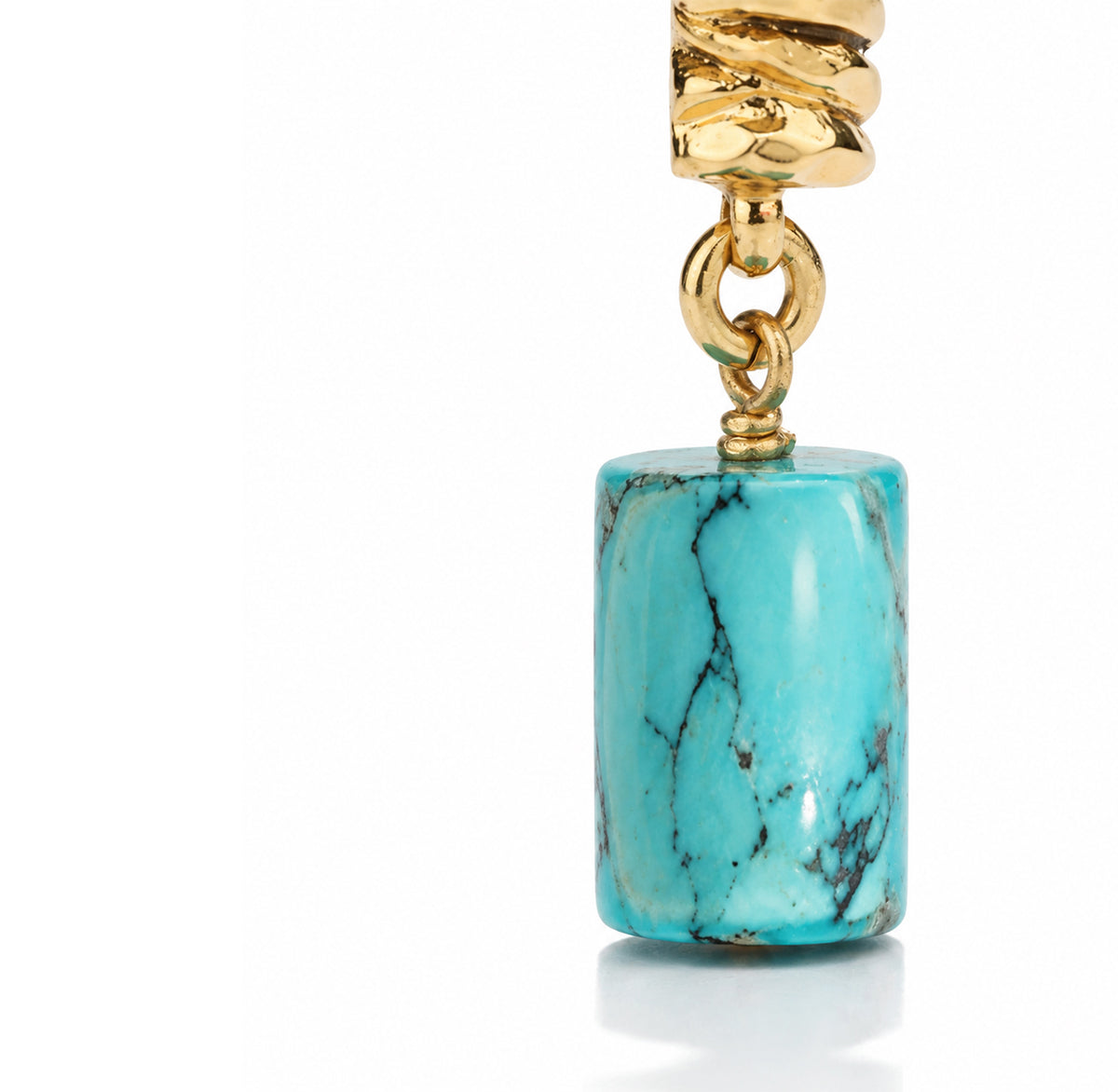 Close-up detail of Twin Form Drop Earrings